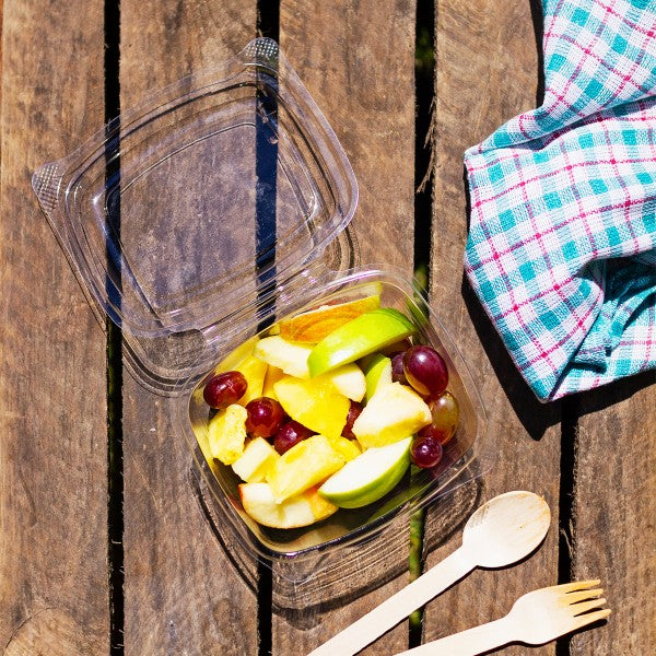 Vegware™ commercially compostable clear rectangular 16-oz hinged deli containers with snap lids are made from plant-based PLA -an eco-friendly plastic alternative independently certified to break down in 12 weeks.