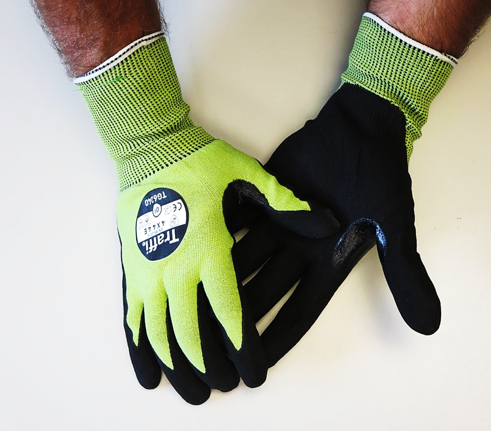 This Eco-friendly Traffi® TG6240 MicroDex LXT® Nitrile Coated Green 15-gauge Cut Level A5 Safety Gloves are Carbon Neutral Certified, repels water and oil with touchscreen compatibility.