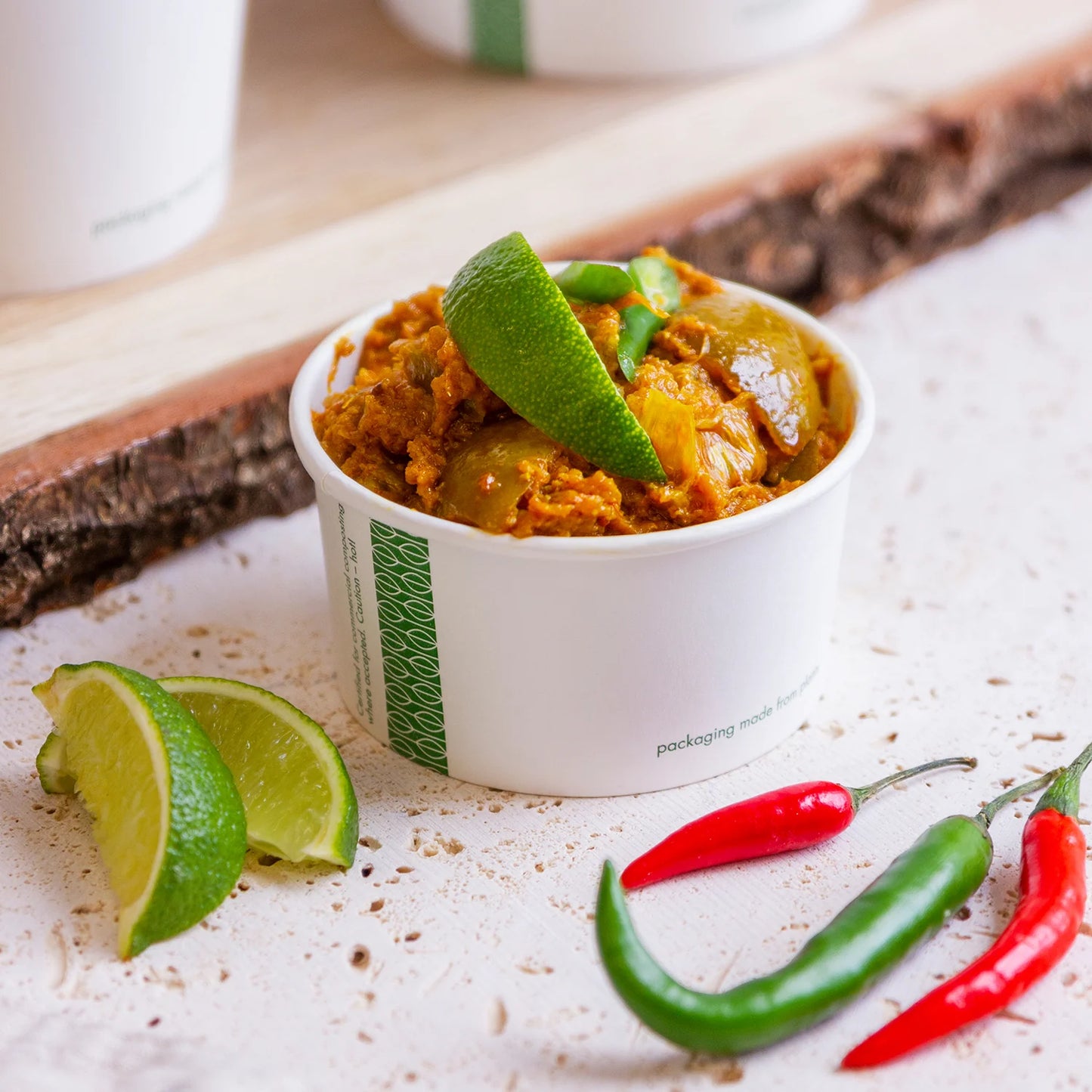 Ideal for ice cream sundaes, pastas, yogurt, stews and soups, Vegware™ 90-Series compostable 6-oz Paper Food Containers are lined with plant-based PLA and independently certified to break down in 12 weeks.