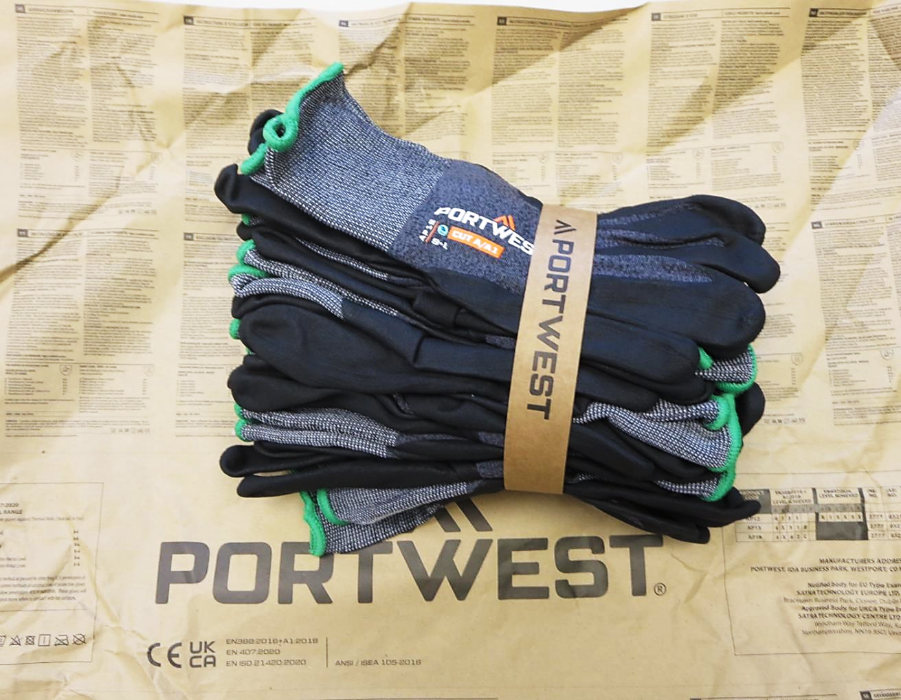 Portwest® Planet AP12-NPR15 Micro Foam Nitrile Coated Work Gloves are packaged in sustainable paper wrapping