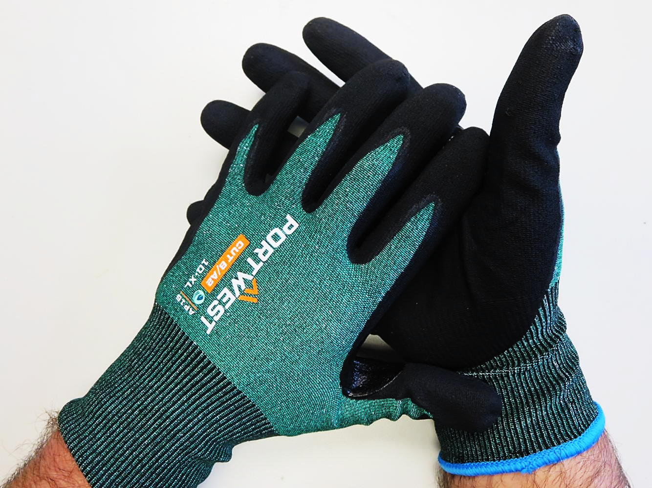 Portwest® Planet AP15 Micro Foam Nitrile Coated 18-gauge Cut Level A2 Work Gloves with Touchscreen Function are constructed from recycled P.E.T. These touchscreen compatible cut level gloves are breathable and produces a low carbon footprint.