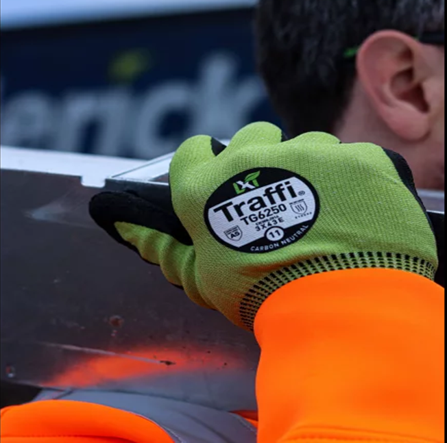 This Eco-friendly Traffi® TG6250 X-Dura LXT® latex coated Green 15-gauge cut level A5 work gloves are Carbon Neutral certified, repels water and oil with touchscreen compatibility.