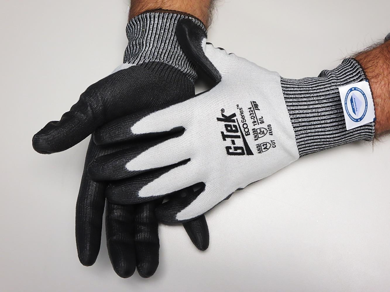 Divert landfill with these sustainable G-Tek® 19-D324 ECO Series™ Dyneema® PU coated cut level A2 industrial work safety gloves from PIP® - uses the latest in bio-based and recycled fiber technologies derived from discarded P.E.T. bottles.