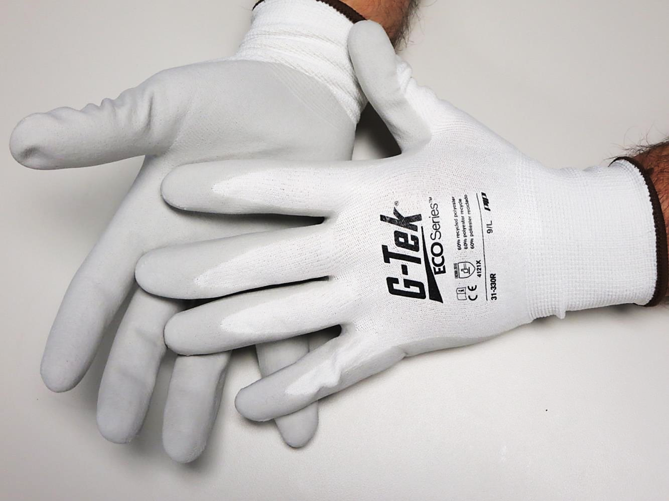 PIP® G-Tek® ECOSeries 13-gauge seamless knit work gloves with nitrile foam palm coating feature a blended liner of fibers made of 90% recycled P.E.T. water bottles and 10% Elastane for comfort, dexterity, breathability.