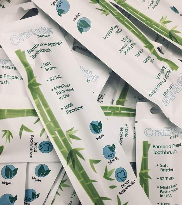 OraBrite® eco-friendly, quality-crafted 26 tuft adult compact head indicator toothbrushes are constructed of biodegradable bamboo, recyclable nylon-6 bristles and 100% recyclable paper packaging.