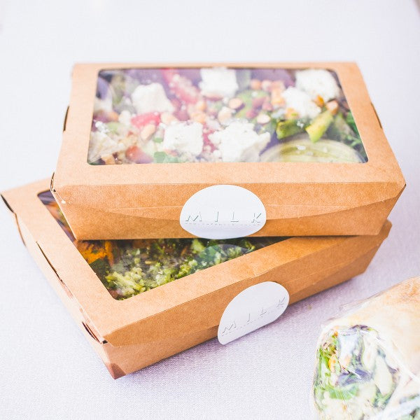Vegware™ compostable 32-ounce  kraft window salad boxes feature sustainable grease-resistant paperboard and a generous clear window that's fully laminated with plant-based PLA. 