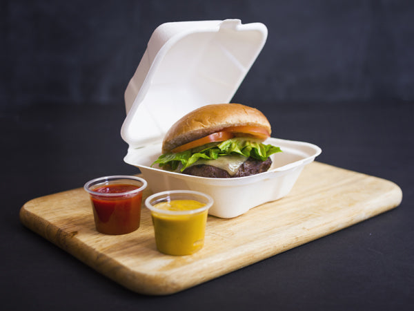 Made from from reclaimed sugarcane, these compostable 6-in hinged Bagasse burger boxes are good for hot or cold food and they're sturdy.