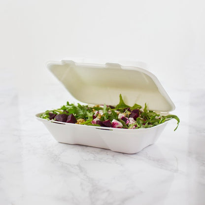 Made from from reclaimed sugarcane, Vegware™ compostable 9-in x 6-in large bagasse clamshell boxes are good for hot or cold food and they're sturdy.