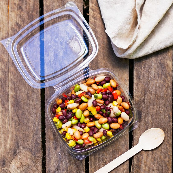 Vegware™ compostable clear rectangular 12-oz hinged deli containers with snap lids are made from plant based PLA -an eco-friendly plastic alternative. Independently certified to break down in 12 weeks.