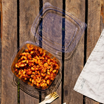 Vegware™ compostable clear rectangular 24-oz hinged deli containers with snap lids are made from PLA -an eco-friendly plastic alternative. Independently certified to break down in 12 weeks.