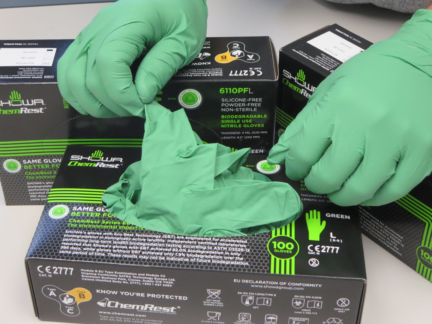 Showa® 6110PF Single-Use 4-mil Green Powder-Free Nitrile Gloves with EBT Eco-Best Technology® brings you the world's first biodegradable disposable nitrile glove. Packed 100 gloves per dispenser box. 