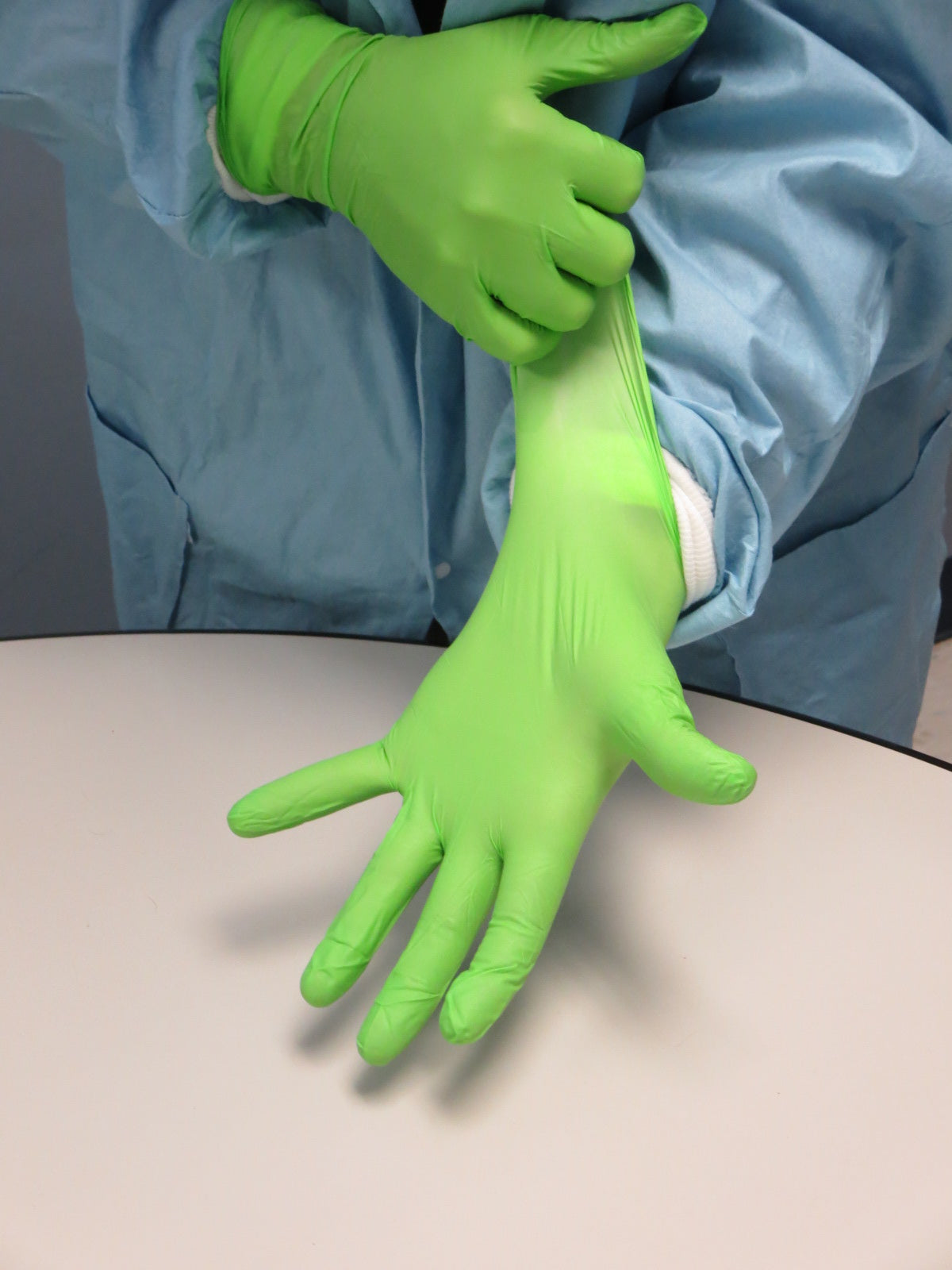 These skin-friendly biodegradable Showa® 7705PFT Accelerator-Free Hi-Viz Single-Use Latex-Free 4-mil Nitrile Gloves with EBT (Eco-Best Technology®) come in eco-dispenser boxes