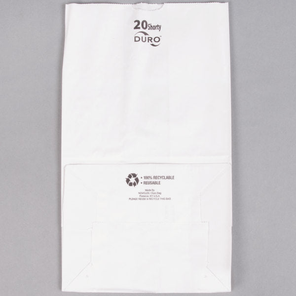 These heavyweight 8-1/4in x 5.31in x 16.12in Duro Bag® Shorty White 40# 20lb SOS Paper Grocery Bags with gusseted flat bottom are biodegradable, reusable & 100% recyclable. 500 per bundle
