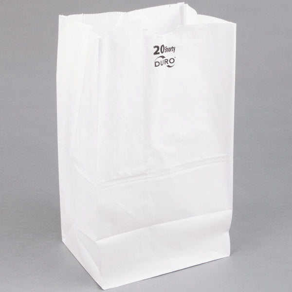 These heavyweight 8-1/4in x 5.31in x 16.12in Duro Bag® Shorty White 40# 20lb SOS Paper Grocery Bags with gusseted flat bottom are biodegradable, reusable & 100% recyclable. 500 per bundle