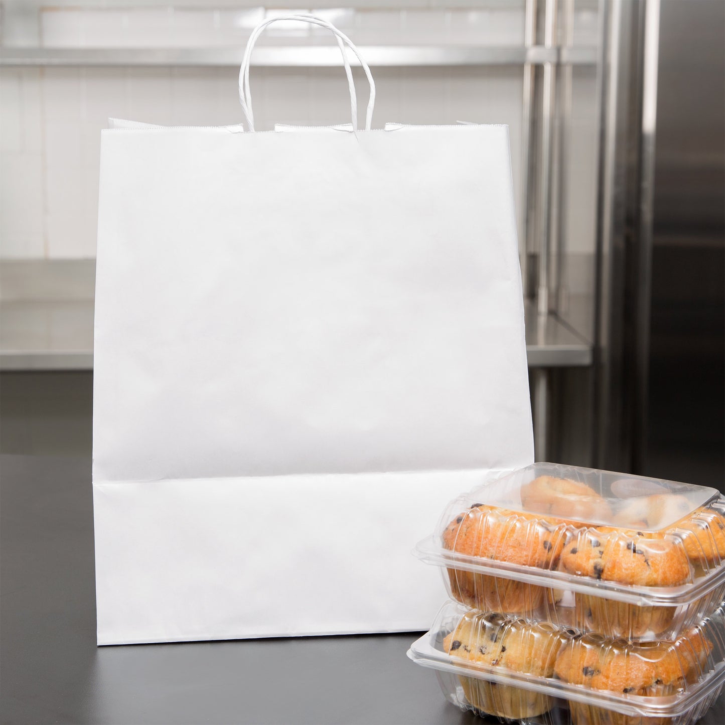 These Eco-friendly 8in x 4.5in x 10.25in Duro Bag® 60# White Tempo Paper Shopping Bags with gusseted flat bottom and paper twist handles ares sold 200 per bundle.