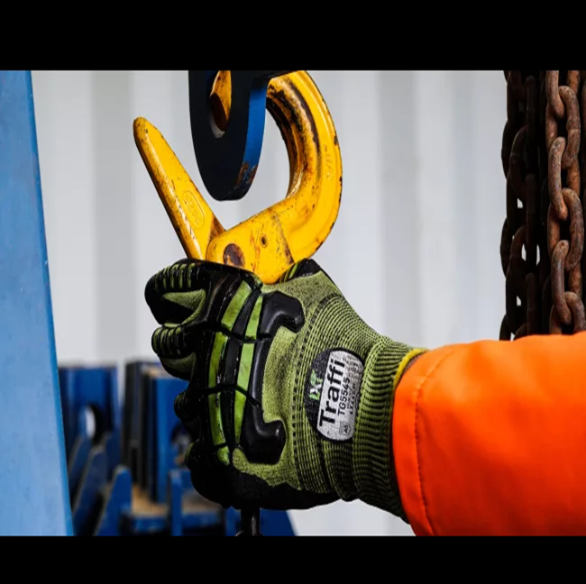  The Eco-friendly Traffi® TG5545 is serious hand protection against knocks, bangs, bumps and lacerations. This tactile 15-gauge industrial work safety glove has a high tenacity green cut level A5 seamless knit blended liner and a palm dipped in Micro-Dex Ultra nitrile coating