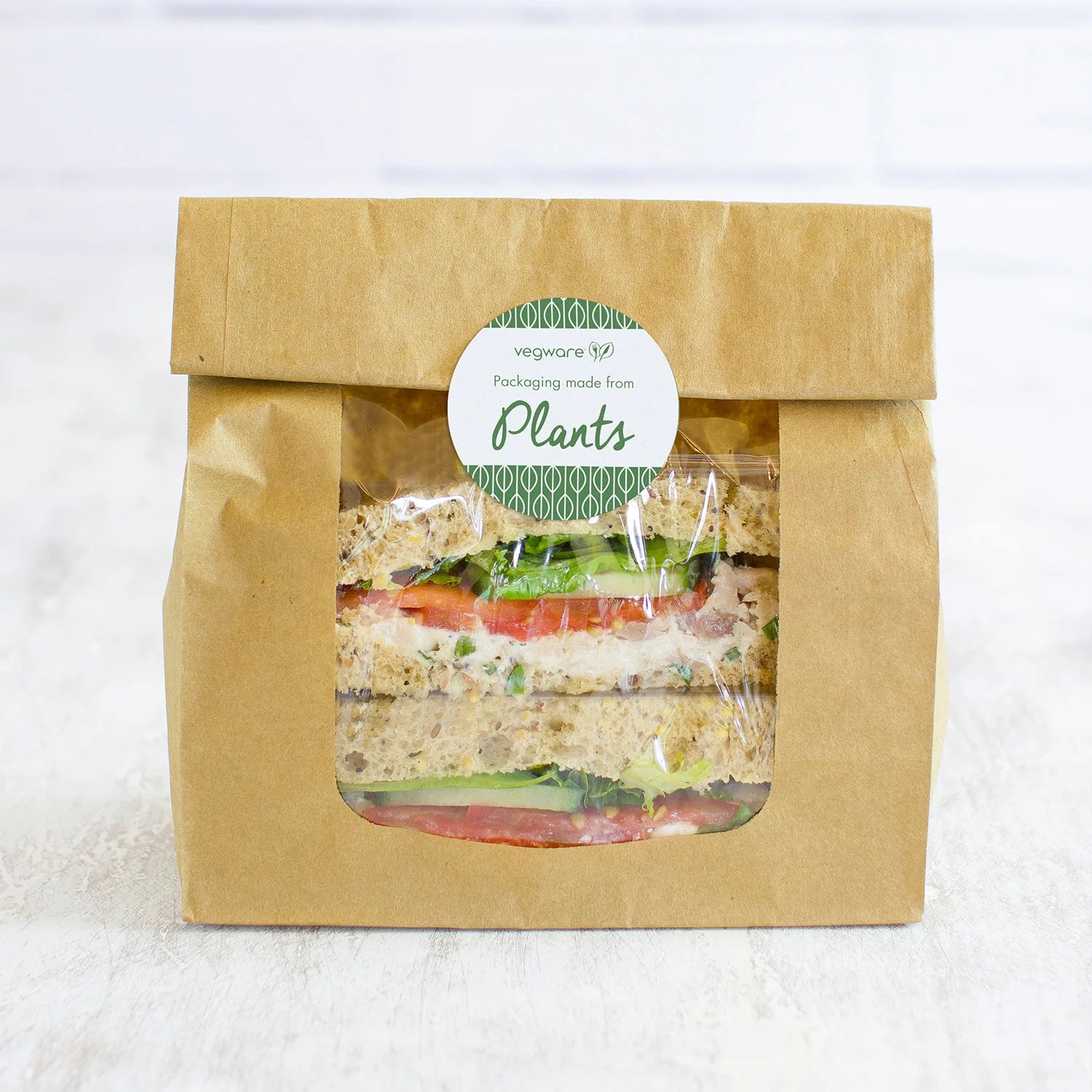Vegware™ compostable kraft Window Bloomer Bags feature 100% recycled paper fully lined with Natureflex grease-proof film from wood pulp.