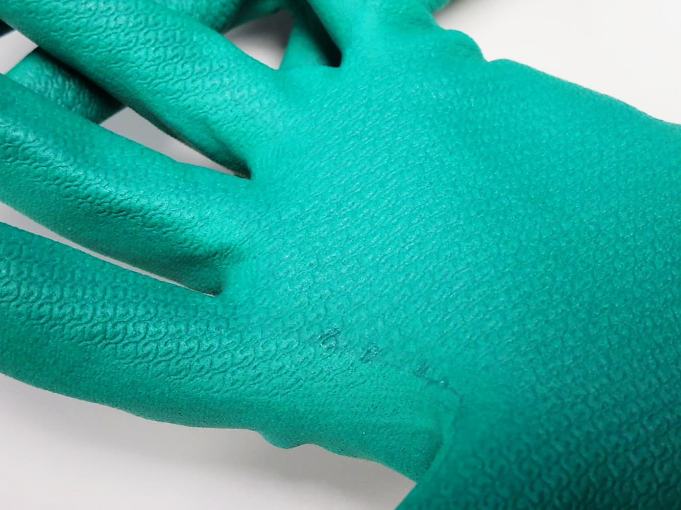 Showa® 383 Sustainable General-Duty Microporous Nitrile Coated Waffle Textured Multi-Purpose Industrial Work Gloves with Eco-Best Technology® provides accelerated biodegradation in landfill. 