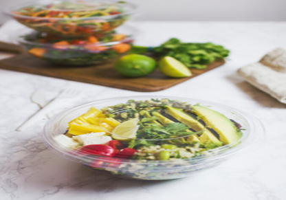 Vegware™ Bon Appetit 185-Series compostable 24-ounce clear wide salad bowls are made from PLA -an eco-friendly plastic alternative made from plants that's independently certified to break down to soil in 12 weeks.